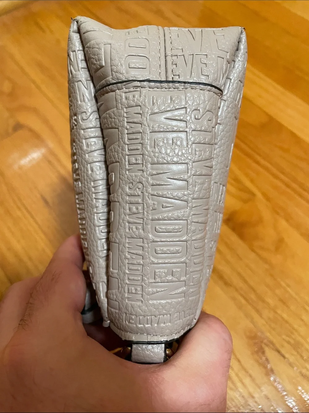 Steve Madden embossed logo crossbody bag beige long adjustable strap